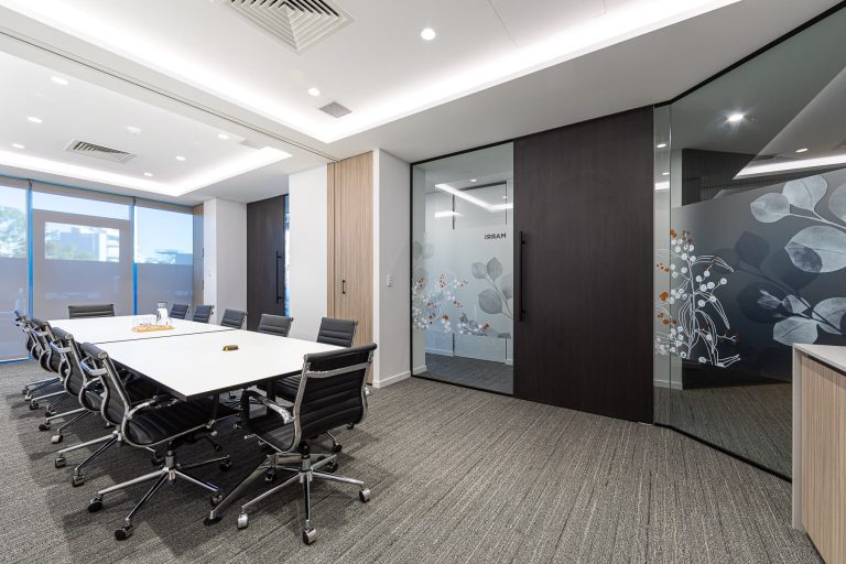 Meeting room with frosted glass and hidden LED lighting.